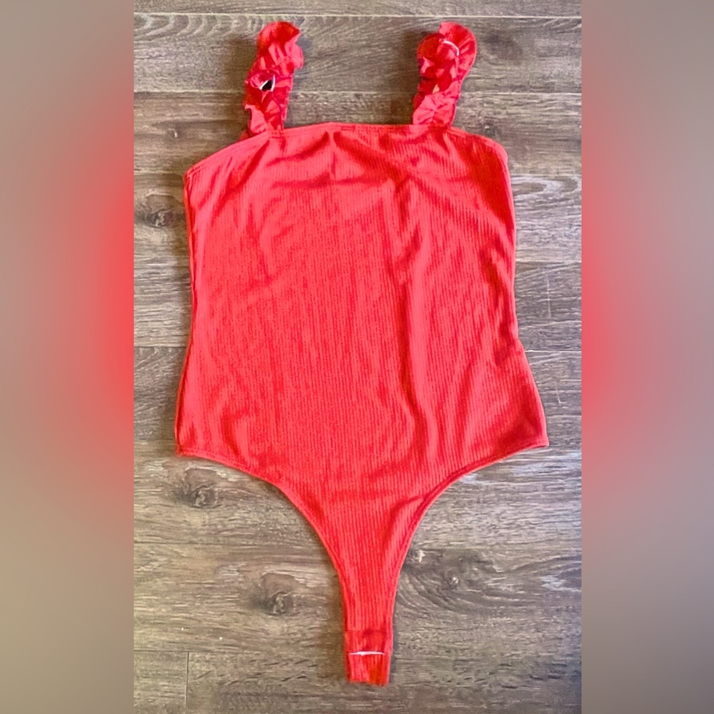 21 Saints Ladies Vibrant Coral Bodysuit with Scoop Neckline and Ruffled Straps